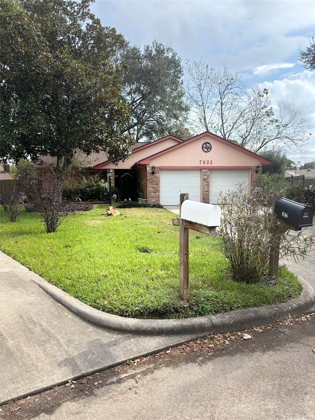 view of home's exterior with a garage and a yard