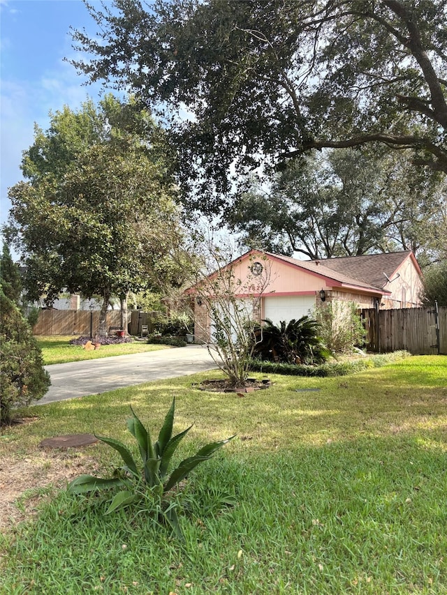 view of yard with a garage