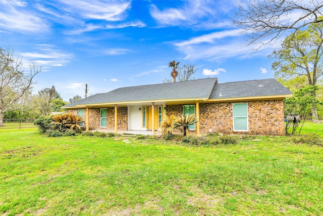 ranch-style house with a front yard