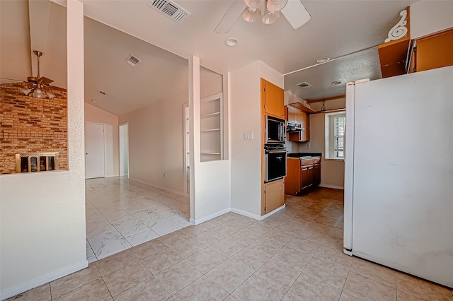 kitchen featuring black appliances, ceiling fan, and vaulted ceiling