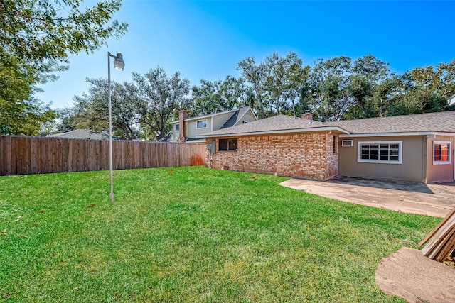 view of yard with a patio area