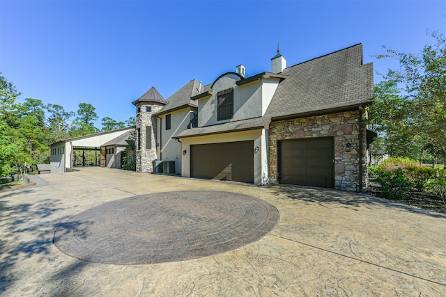 view of property exterior featuring a garage