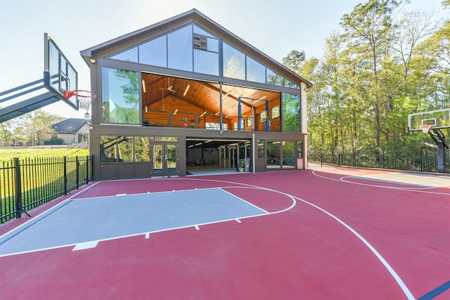 5015 Ossineke Ct, Spring, TX 77386 - view of basketball court featuring basketball hoop and plenty of natural light