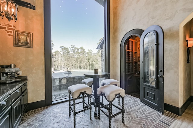5015 Ossineke Ct, Spring, TX 77386 - dining area with brick flooring and arched walkways