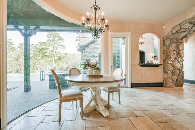 dining room featuring a notable chandelier