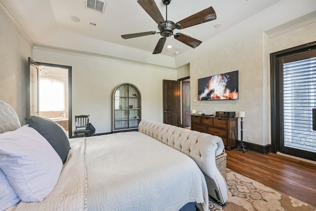 5015 Ossineke Ct, Spring, TX 77386 - bedroom with wood finished floors, baseboards, and ceiling fan