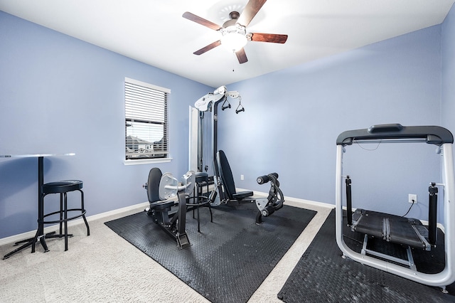 exercise area featuring carpet floors and ceiling fan