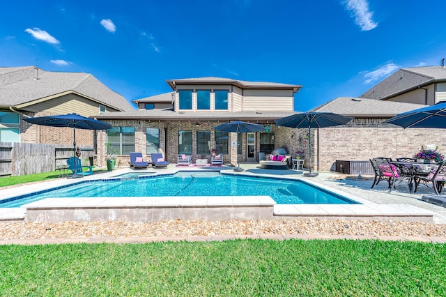 view of pool featuring a patio