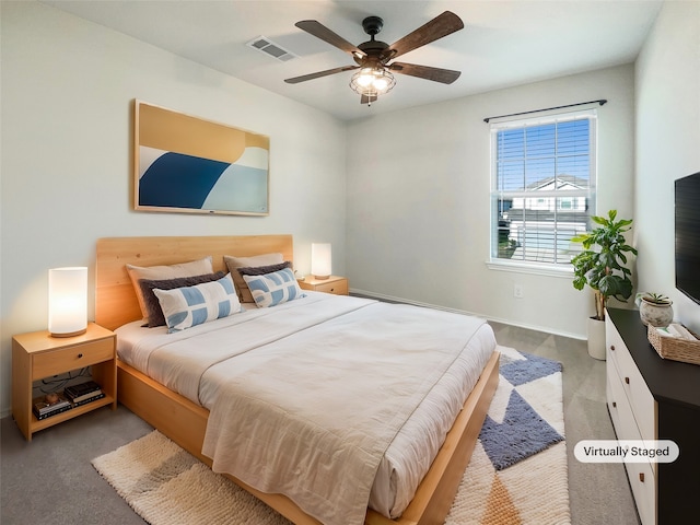 carpeted bedroom featuring ceiling fan