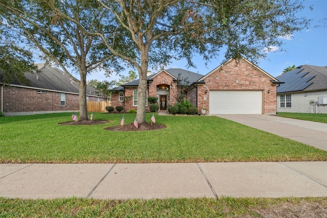 view of front facade featuring a garage and a front yard