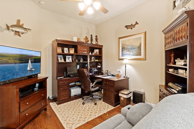 office area featuring dark wood-type flooring and ceiling fan