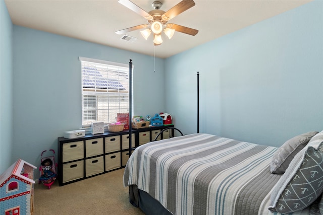 carpeted bedroom featuring ceiling fan