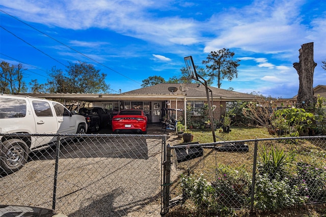 exterior space with a carport