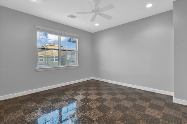 empty room featuring ceiling fan