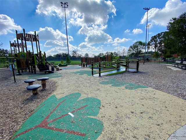 view of home's community with a playground