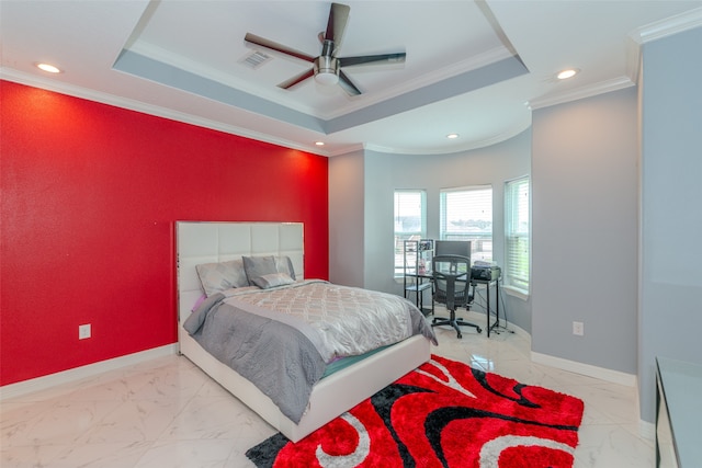 bedroom featuring a tray ceiling, ceiling fan, and crown molding