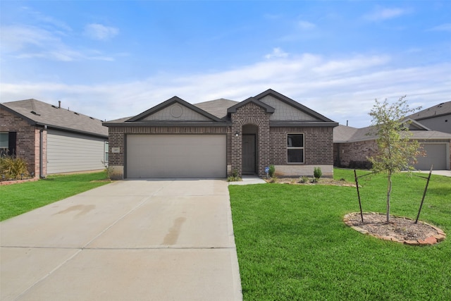 view of front of property featuring a garage and a front lawn