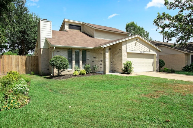 view of front facade featuring a garage and a front yard