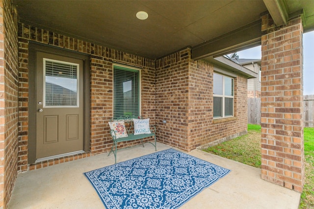 property entrance with a patio