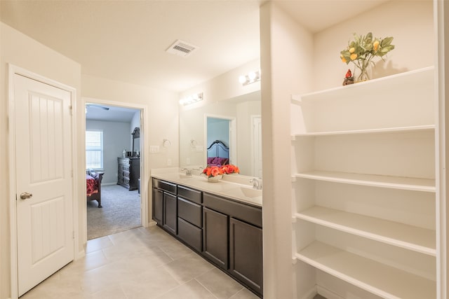 bathroom featuring vanity and tile patterned flooring