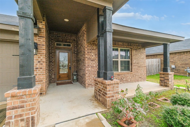 entrance to property with a patio area