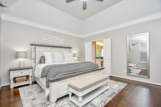 bedroom with ensuite bathroom, ceiling fan, dark hardwood / wood-style flooring, and crown molding