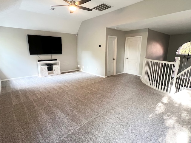 unfurnished living room featuring carpet flooring, ceiling fan, and lofted ceiling