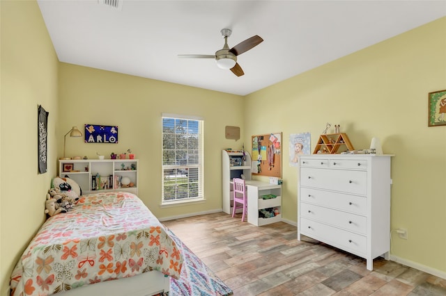 bedroom featuring ceiling fan and light hardwood / wood-style flooring