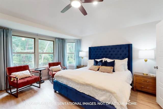 bedroom featuring light wood-type flooring and ceiling fan