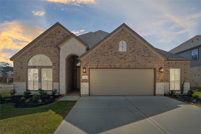 view of front of home with a garage