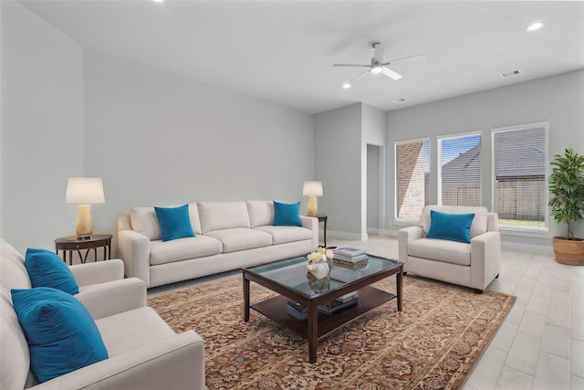 living room featuring ceiling fan