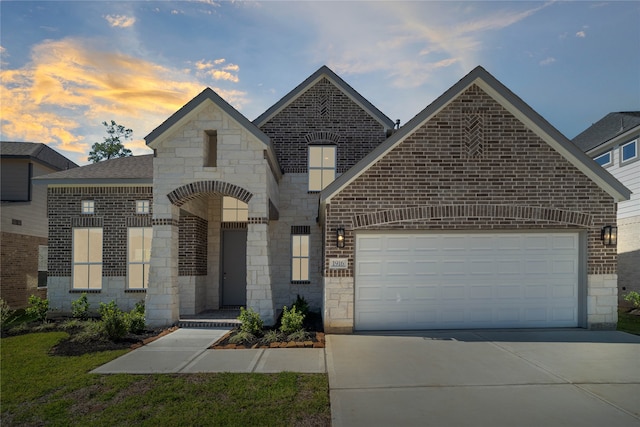 view of front of home with a garage