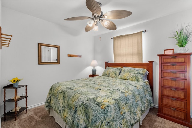 211 Ocean Dr, Surfside Beach, TX 77541 - bedroom featuring carpet and a ceiling fan