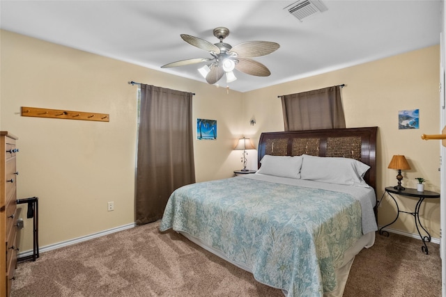211 Ocean Dr, Surfside Beach, TX 77541 - bedroom featuring carpet and a ceiling fan