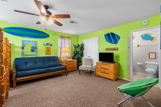 211 Ocean Dr, Surfside Beach, TX 77541 - carpeted living area with a ceiling fan and baseboards