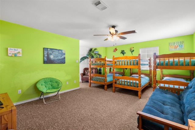 211 Ocean Dr, Surfside Beach, TX 77541 - carpeted bedroom featuring a ceiling fan and baseboards