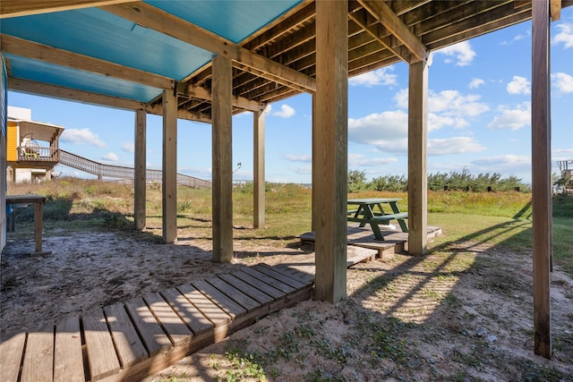 211 Ocean Dr, Surfside Beach, TX 77541 - wooden deck featuring a yard