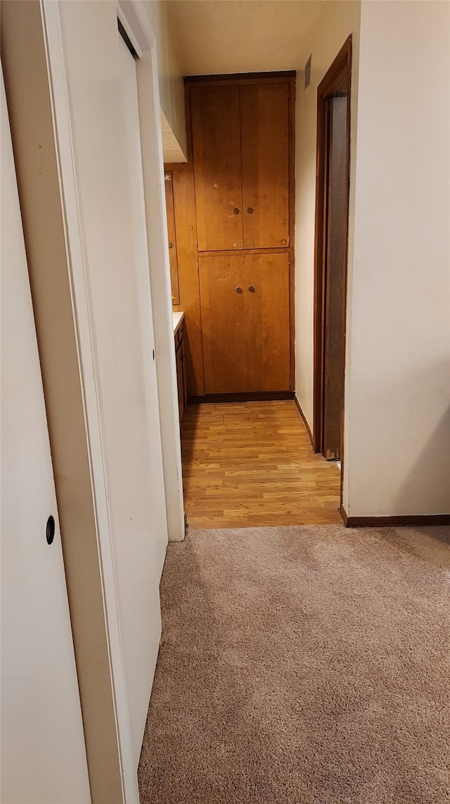 hall featuring light wood-type flooring