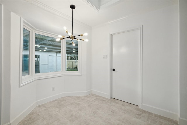 unfurnished dining area with ornamental molding and a chandelier