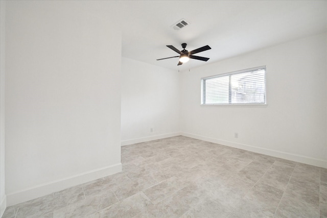 empty room featuring ceiling fan