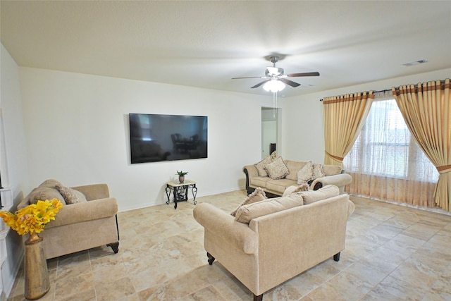 living room with ceiling fan