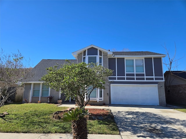 view of front of house featuring a garage and a front yard