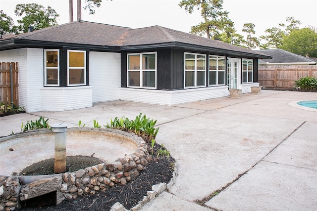 back of house featuring a patio