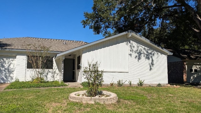 exterior space with a front yard