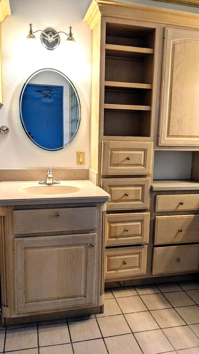 bathroom with vanity and tile patterned floors