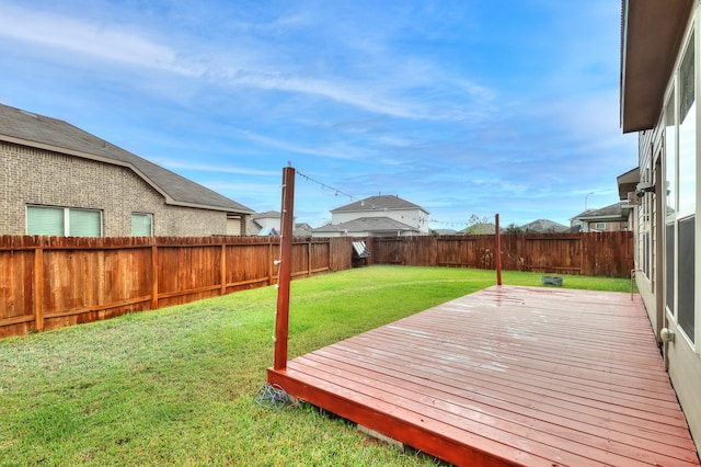 view of yard with a wooden deck