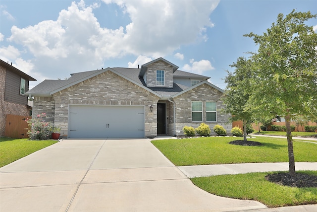 craftsman-style home with a garage and a front yard