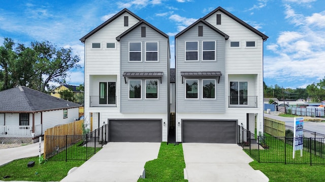 view of front of house with a front lawn and a garage