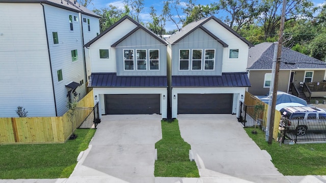 view of front facade featuring a garage and a front yard