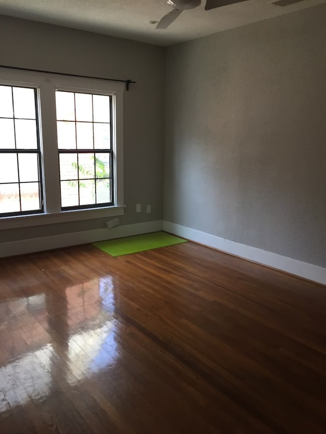 spare room featuring hardwood / wood-style flooring